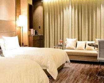 Enjoy Hotel - Jinan - Habitación