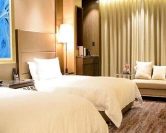 Enjoy Hotel - Jinan - Habitación