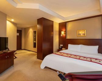 Ramada by Wyndham Wujiaochang Shanghai - שנחאי - חדר שינה
