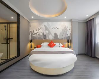 Thank Inn Hainan Lingshui County Xiangyu Avenue - Lingshui - Bedroom