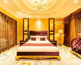 Tianhe Hotel - 楽山（ラクサン） - 寝室