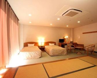 Hotel Taihei Onsen - Kanoya - Camera da letto
