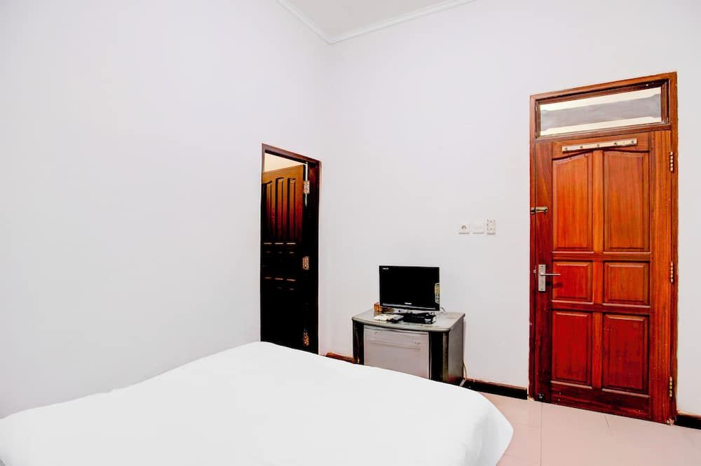 Hotel O Balikpapan near Taman Beruang Madu formerly Palm Cafe Inn - באליקפאפן