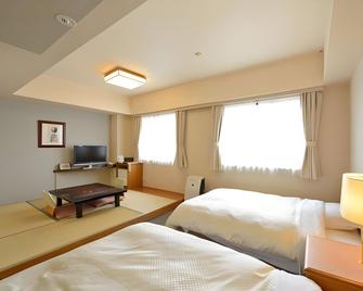 Shikisai Hotel Chiyoda-Kan - Saga - Schlafzimmer