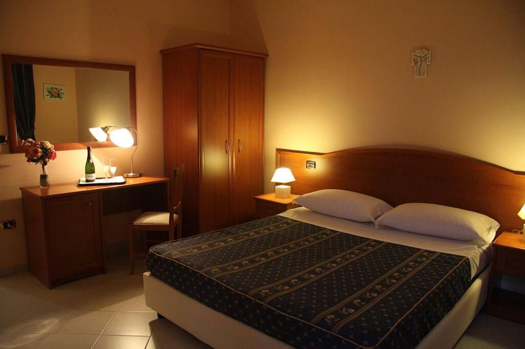 أجريتوريزمو فيلا جوليا - بومباي - غرفة نوم