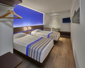 City Express Junior by Marriott San Luis Potosí Zona Industrial - סן לואיס פוטוסי - חדר שינה