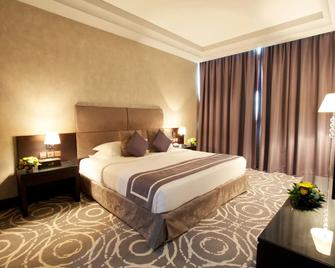 فندق مانغروف - رأس الخيمة - غرفة نوم