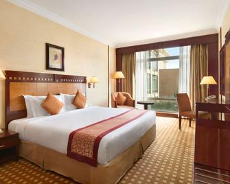 فندق رامادا الرياض - الرياض - غرفة نوم