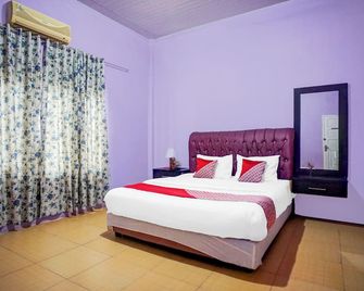 Hotel O Banda Aceh near Masjid Raya Baiturrahman formerly Wisma Tsacita - Banda Aceh - Habitación