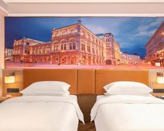 Vienna Hotel Shenzhen Aiguo Road - Shenzhen - Schlafzimmer