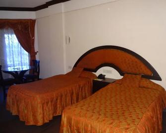 Manuelsons Malabar Palace - Kozhikode - Bedroom