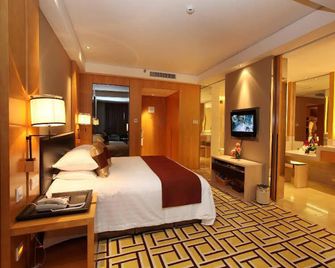 New Century Pujiang Hotel - Jinhua - Slaapkamer