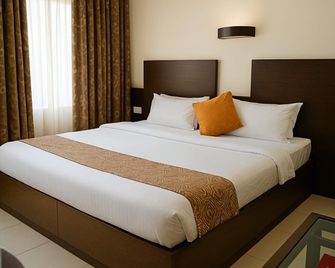 Hotel International, Kolhapur - Kolhapur - Habitación