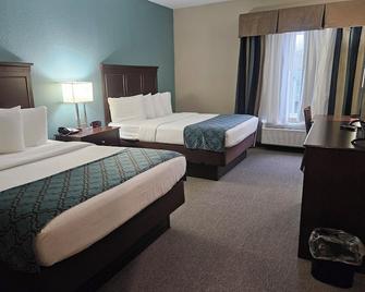 Heritage Place Hotel And Suites - DeQuincy - Habitación