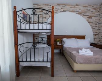 Naxos Palace Hotel - Stelida - Schlafzimmer