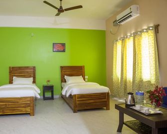 Rains Inn Eco Hotel - Dimāpur - Habitación