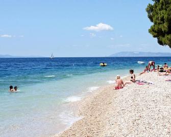 Apartments by the sea Zivogosce - Porat, Makarska - 18218 - Igrane - Playa