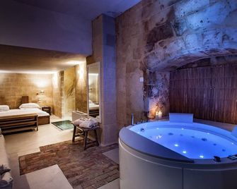 إ هوتل إن بيترا - ماترا - غرفة نوم