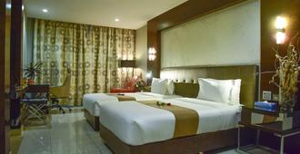 Harbour View Suites - Dar Es Salaam - Yatak Odası