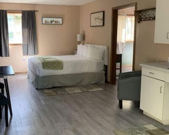 Suite 32 - King Suite - Helena - Makuuhuone