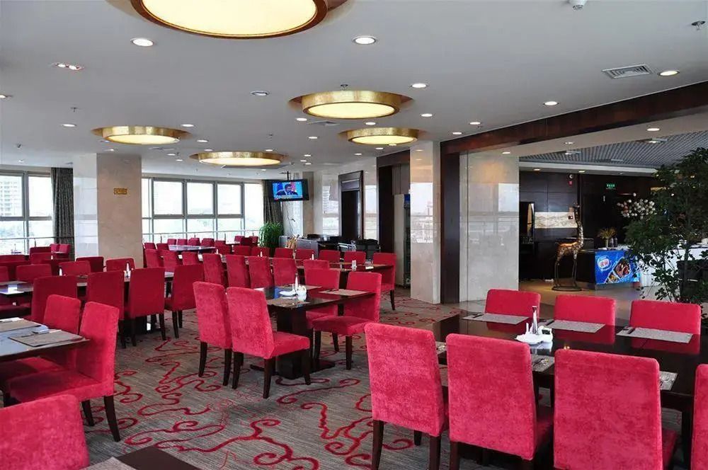 Haitian Sports Center Hotel - تشينغداو - مطعم