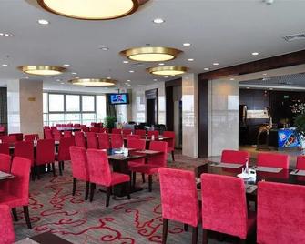 Haitian Sports Center Hotel - Qingdao - Restaurang