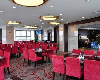 Haitian Sports Center Hotel - تشينغداو - مطعم