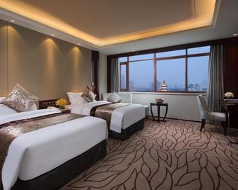 Nanchang Jin Feng Hotel - נאנצ'אנג - חדר שינה