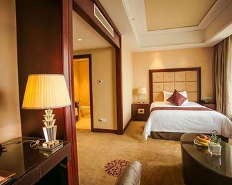 Manju Hotel - Xinxiang - Bedroom