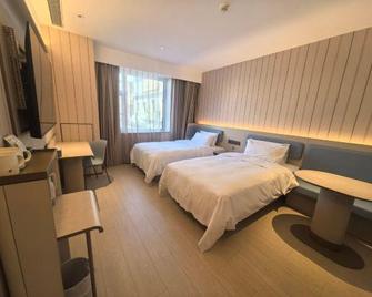 Hanting Hotel Jixi Railway Station - Jixi - Habitación