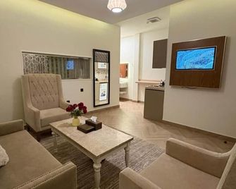 Sewar Al Thahab Serviced Apartments - Medina - Living room