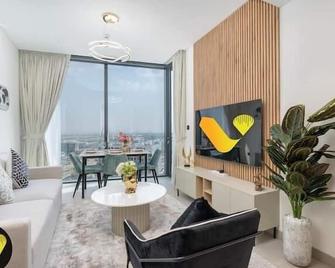 Vogue Sobha Hartland lush oasis near Downtown - Dubái - Sala de estar