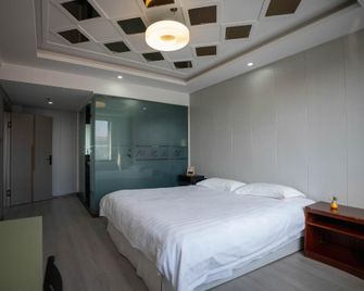 Xincheng Yangguang Business Apartment - Harbin - Chambre