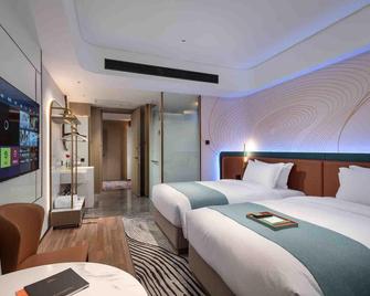 Yazhi Hotel - Changsha - Schlafzimmer