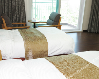 Suncheon Booyoung Hotel - Suncheon - Bedroom