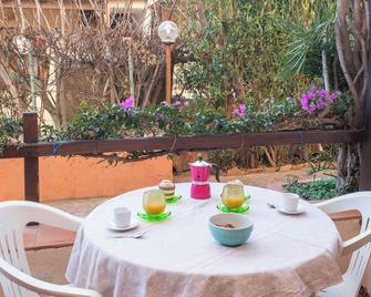 Piazzetta Mono Porto 50m From The Beach - Happy Rentals - Porto San Paolo - Patio
