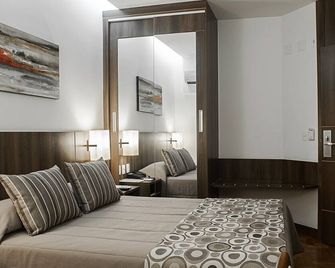 Normandy Hotel - Belo Horizonte - Schlafzimmer