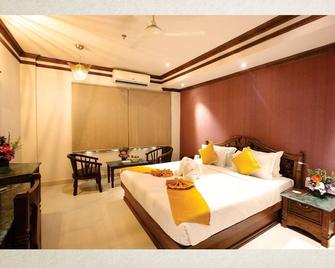Hotel Ambalakkara Regency - Kottarakara - Bedroom