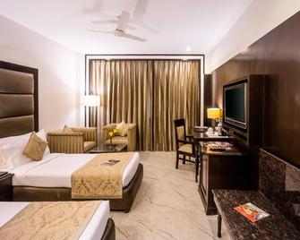 Hotel Shanti Palace Mahipalpur - นิวเดลี - ห้องนอน