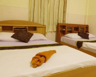 Invito Guesthouse - סיהנוקוויל - חדר שינה