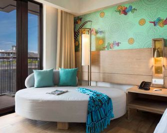 إيستين آشتا ريزورت كانجو - North Kuta - غرفة نوم