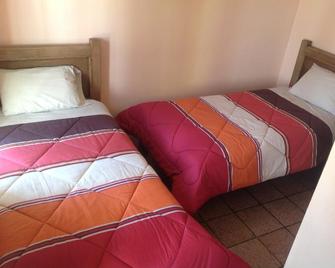Posada Sancris - سان كريستوبال دي لاس كاساس - غرفة نوم