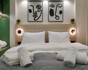 Plane Tree Luxury Suites - Ioannina - Schlafzimmer