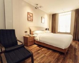 Manchen Hotel - Xi'an - Habitación