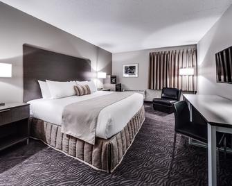 Heritage Inn Hotel & Convention Centre - High River - High River - Спальня