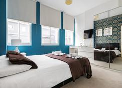 City Apartments - Londra - Yatak Odası