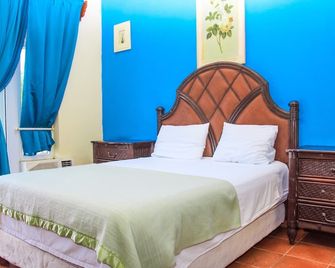 West End Dive Resort - Coxen Hole - Schlafzimmer