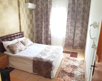 Talaslioglu Hotel - Kayseri - Schlafzimmer