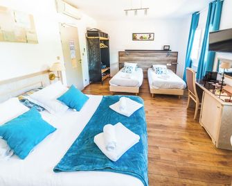 Logis Hôtels La Bastide des Golfs - Mouans-Sartoux - Camera da letto
