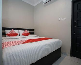 OYO 1253 Wismakito Syariah - Lubuklinggau - Habitación
